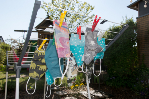 Clothes masks washed and hanged on clothes lines