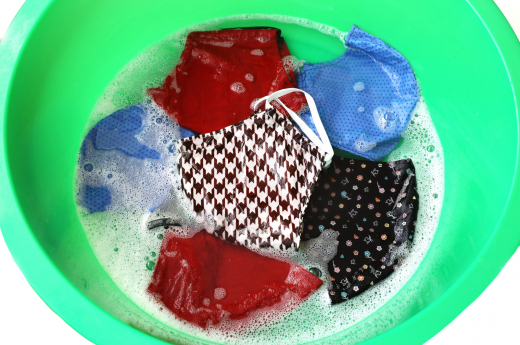 Cloths masks in a hand washing basin