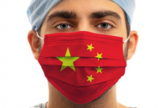 Doctor with China flag medical mask isolated on white background