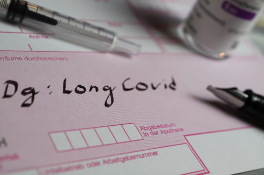 Closeup Of Word Long Covid On German Prescription Form